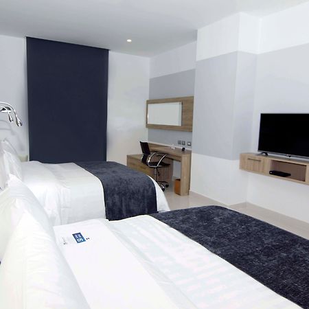 Sky Collection Lifestyle Hotel & Suites Barranquilla Barranquilla (Atlantico) Exterior foto A room at the hotel